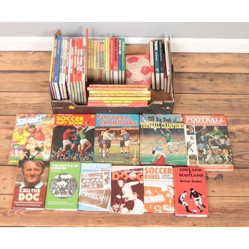 469 - A box of football annuals and books. Includes Shoot, Charles Buchan's gift books, autobiographies, e... 