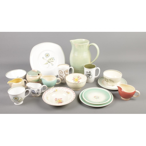 132 - A collection of Susie Cooper ceramics. Include large pottery jug and tea wares.