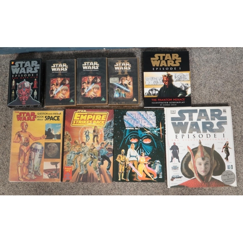 527 - A quantity of Star Wars books and videos. Includes annual No.1 & 2, VHS Phantom Menace & Attack of t... 