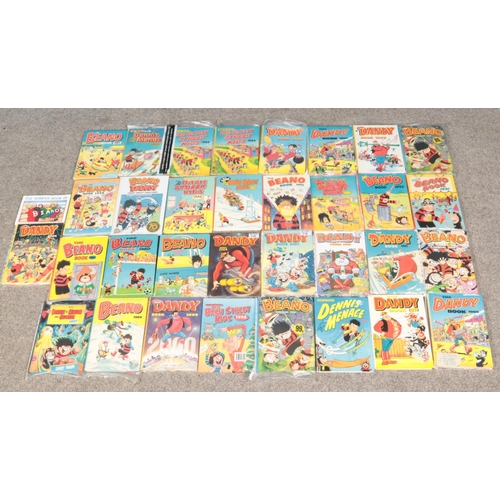 534 - A box of Beano and Dandy annuals.