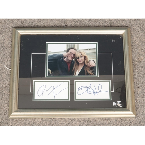 542 - Signed and framed photo of Quentin Tarantino &
Daryl Hannah 46cm x 36cm