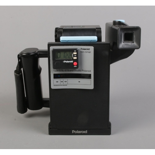 108 - A Polaroid Mini Portrait ID/Passport camera with protective cover.