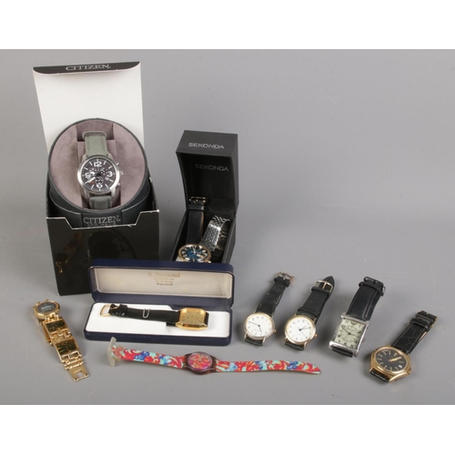 120 - A collection of assorted Gents wristwatches, including Sekonda and Timex examples.