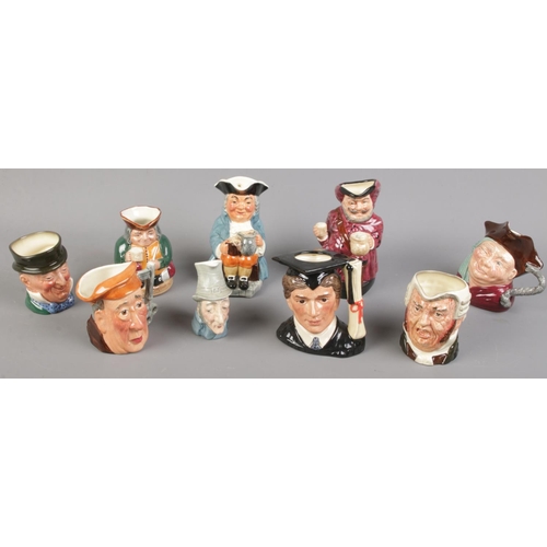 123 - Nine ceramic character jugs. Includes Royal Doulton examples, Falstaff, The Graduate D6916, Honest M... 