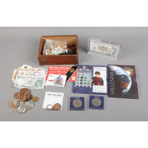 150 - A collection of assorted, most pre-decimal, coins and banknotes including 1994 Brilliant Uncirculate... 