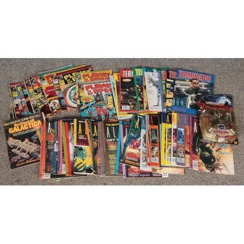 176 - A collection of comics including 1970's Planet of the Apes, Alien, Terminator and a Marvel History D... 