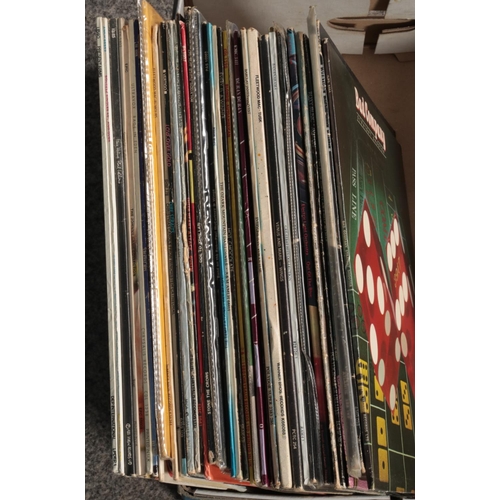 180 - A collection of vinyl records of mainly pop and rock examples to include Pink Floyd, Led Zeppelin, B... 