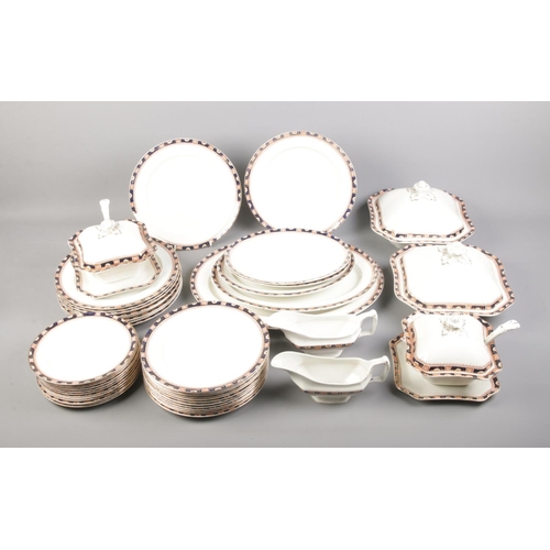 28 - A Wood & Sons 'Windsor' dinner service comprising of tureens, plates, gravy jugs, etc.