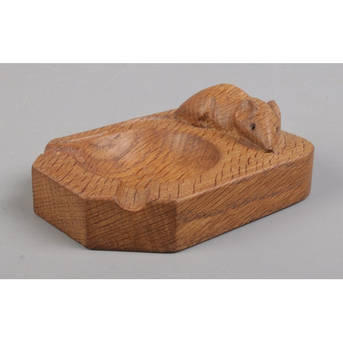 3 - A Robert Thompson 'Mouseman' oak ashtray. 10cm long.