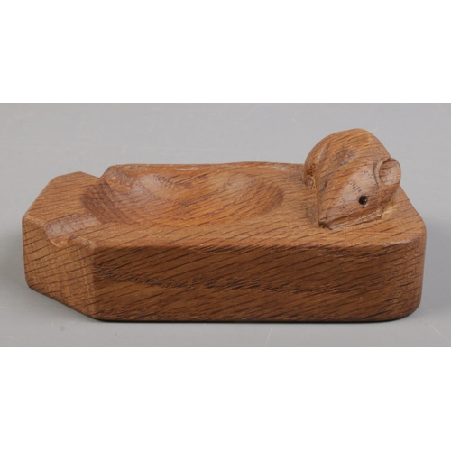 3 - A Robert Thompson 'Mouseman' oak ashtray. 10cm long.