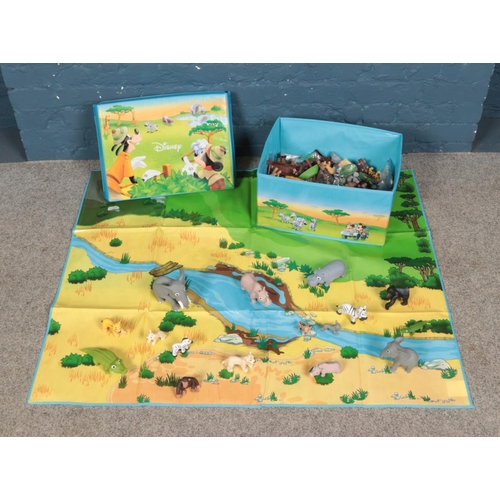 207 - A Disney Animal World safari toy set with box, play mat and assorted figures.