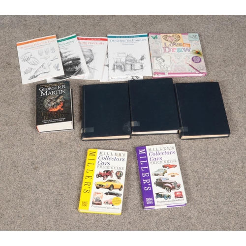 210 - A collection of assorted books including Airfix Magazine, George R.R Martin, artist reference books,... 