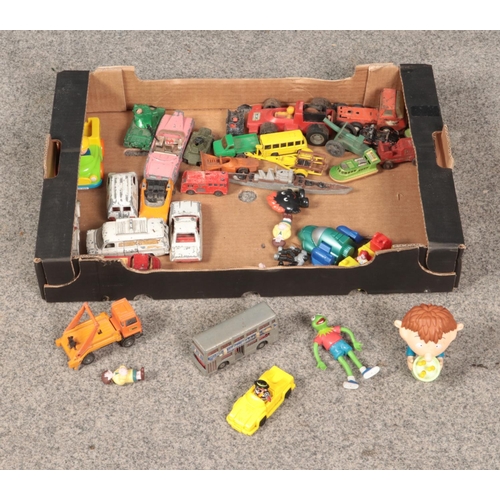 220 - A box of assorted diecast vehicles and miscellaneous toys including Matchbox, Corgi, Dinky, etc.