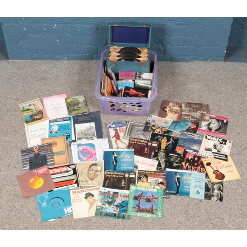 228 - A quantity of records and ephemera. Includes theatre programmes, singles, cassettes, etc.