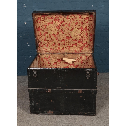 245 - A painted metal bound trunk. Approx. dimensions 57cm x 50cm x 61.5cm.