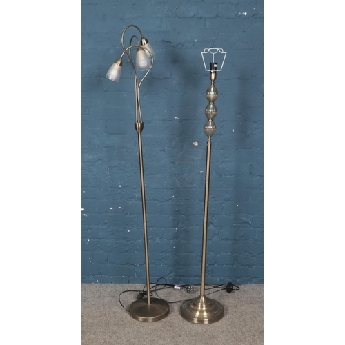 251 - Two modern chrome standard lamps.