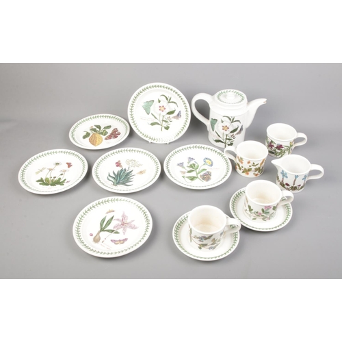 40 - A Portmerion The Botanic Garden pattern tea service to include tea pot, tea cups and plates. Approx.... 