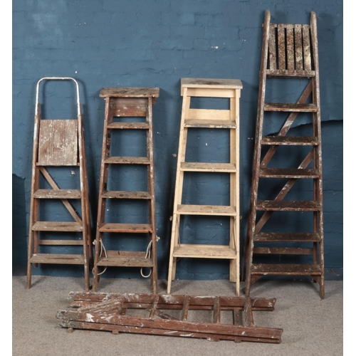 256 - Five sets of wooden step ladders. Tallest example 200cm.