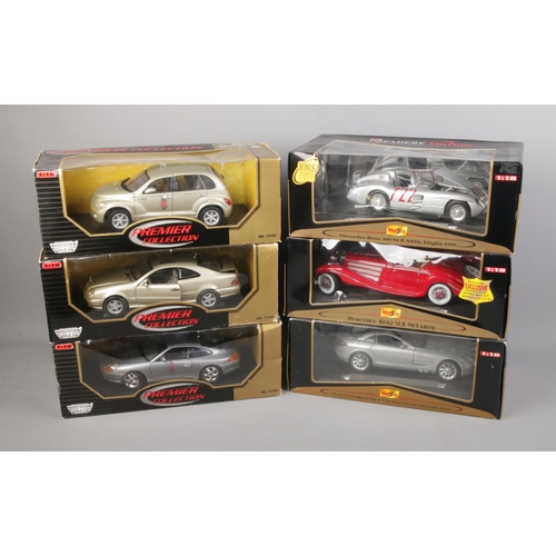 269 - Six boxed Premier Collection 1/18 scale diecast cars including Porsche 911, Chrysler GT Cruiser, Mer... 