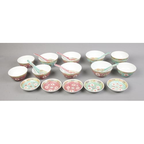 46 - A collection of coloured oriental dishes and spoons, stamped to base.