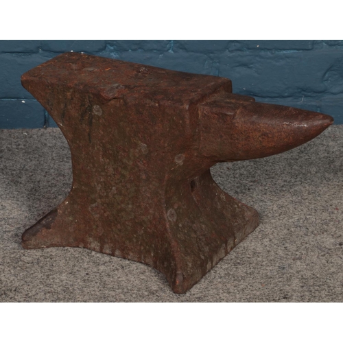 326 - A small blacksmiths anvil. (24cm x 44cm)