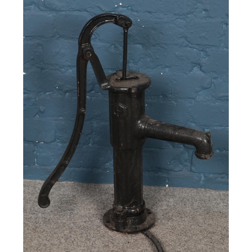 337 - A cast iron water pump. (69cm)