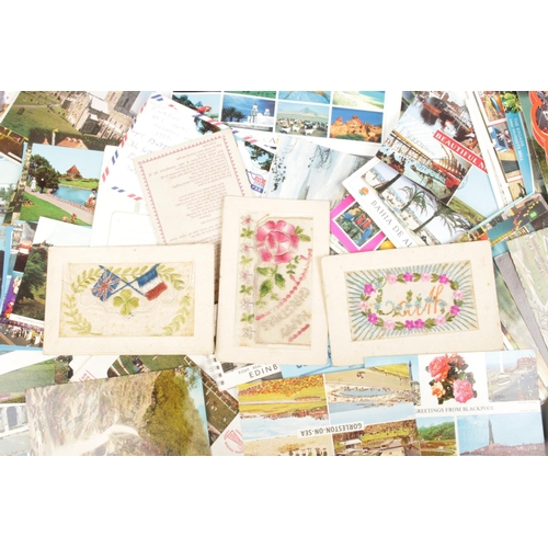 54 - A very large quantity of mainly British postcards, to include vintage and sewn examples.