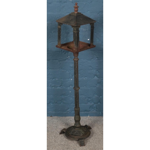 346 - A cast iron birds house. (115cm)