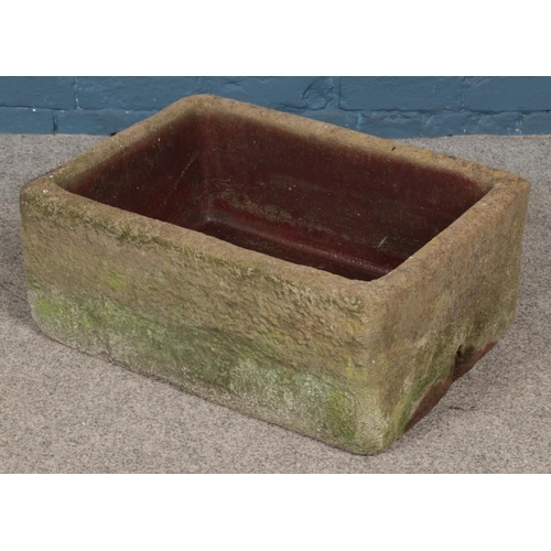 349 - A concrete sink. (26cm x 63cm x 47cm)