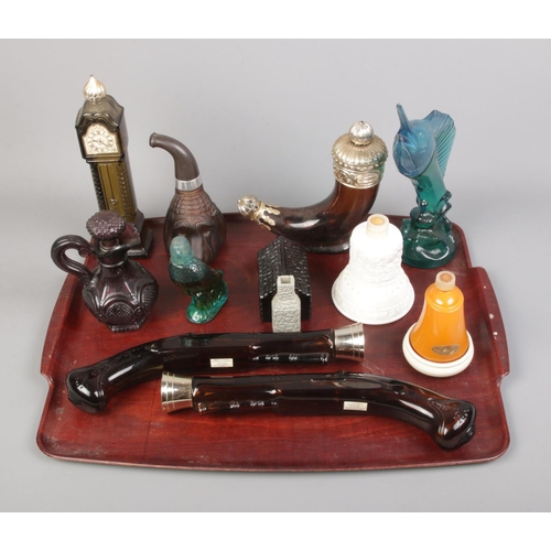 57 - A tray of Avon scent/aftershave bottles including swordfish, pistols and horn examples.