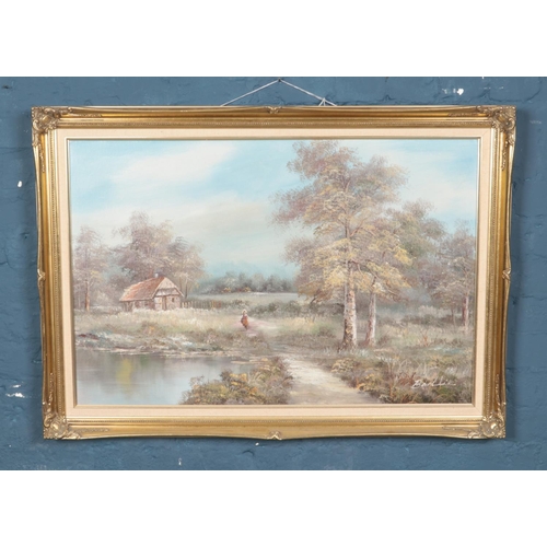 366 - A gilt framed oils on canvas one depicting cottage by a river, signed Baillie to lower right. Approx... 