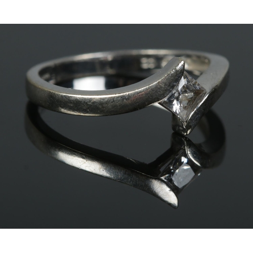 399 - A 9ct white gold ring set with single cubic zirconia ring. Size O. Stamped 375 to inside of band. To... 