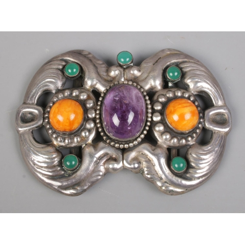 405 - A Danish silver two-piece belt buckle, set with polished stones and with makers mark for William Fug... 