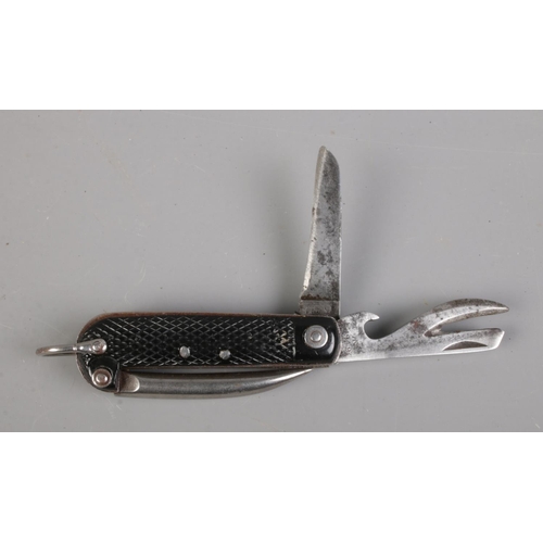 420 - A J. Rodgers & Sons 1949 multi tool/knife featuring Maltese cross stamp to blade.