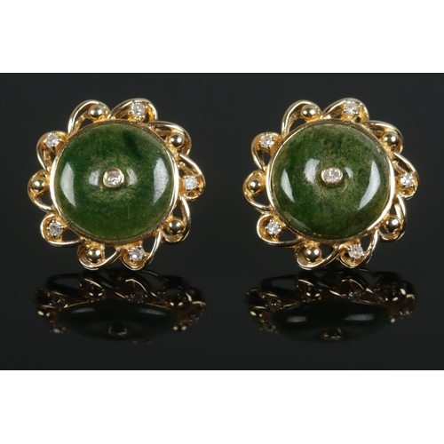 437 - A pair of 18ct Gold, Jade and Diamond ear studs. Total weight: 5.7g