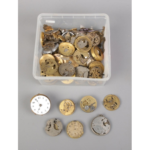 71 - A box of assorted pocket watch spares including dials, movements, cases, etc.