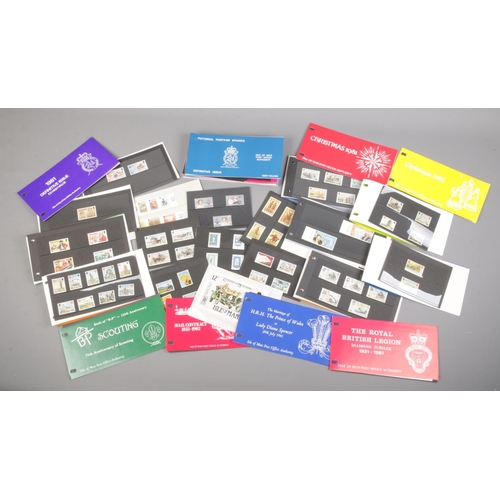 73 - A collection of Isle of Man Post Office Authority presentation stamps in card files, with some blank... 