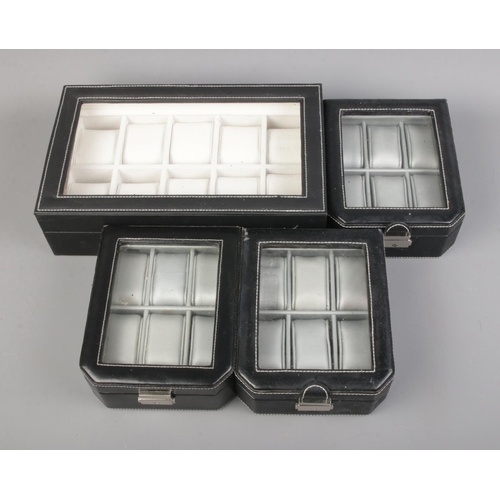 74 - Four wrist watch display boxes.