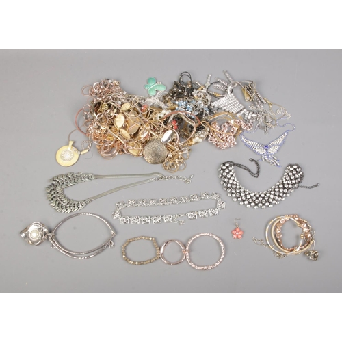 79 - A large collection of costume jewellery statement necklaces including simulated pearl, pendants and ... 