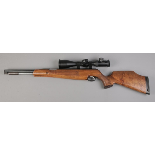 465 - An Air-Arms TX200 cal .177/4.5mm underlever air rifle, with left handed walnut stock. Fitted with Ha... 