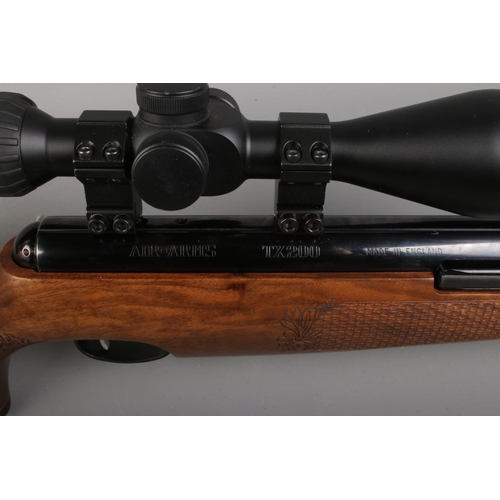 465 - An Air-Arms TX200 cal .177/4.5mm underlever air rifle, with left handed walnut stock. Fitted with Ha... 