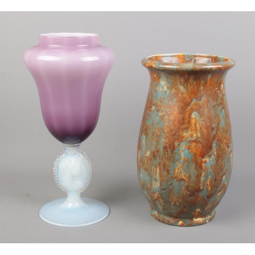 83 - An amethyst and vaseline glass vase with translucent figure of a woman to the stem, together with a ... 