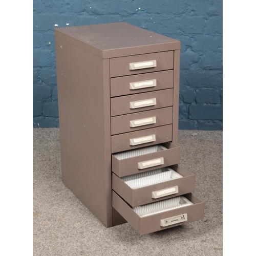 486 - An eight drawer small filing cabinet currently with fitted interior suitable for slides. Approx. dim... 