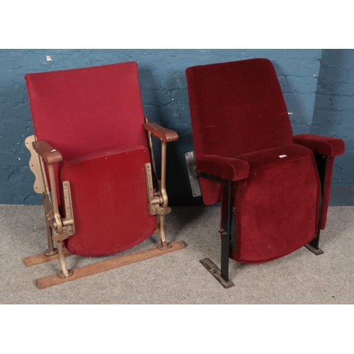 488 - Two red velvet cinema seats.