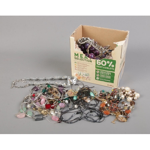 95 - A quantity of assorted costume jewellery including necklaces, bracelets, etc.