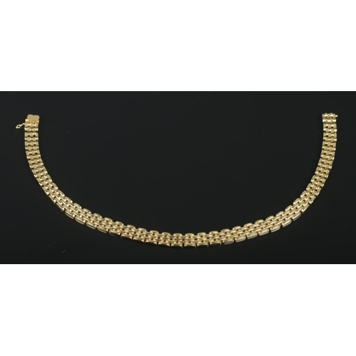 120 - An 18ct gold panther link collar necklace. Length approximately 43cm. 107.71g. Stamped 750 to clasp.