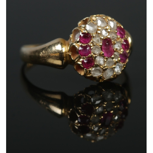 138 - A late Victorian gold ruby and diamond cluster ring. Size M 1/2. 3.79g. Tests as high carat.