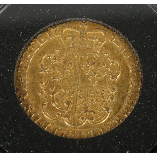 141 - A George III gold coin set, comprising of 1782 rose shield guinea, 1793 spade shield guinea and 1817... 