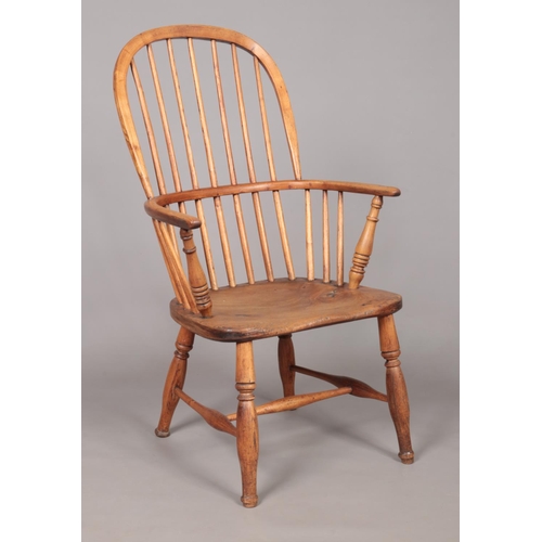 166 - A 19th century ash/elm Windsor arm chair with spindle back. Height of back 97cm, Front seat width 48... 