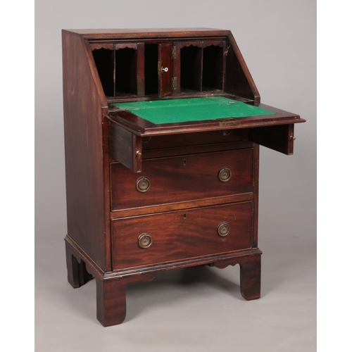 169 - A small mahogany ladies bureau. Height 88cm, Width 52.5cm, Depth 40cm.